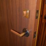 Brickell City Center wood panel door lock close up Thumbnail
